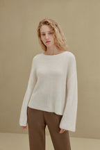 women in white sweater