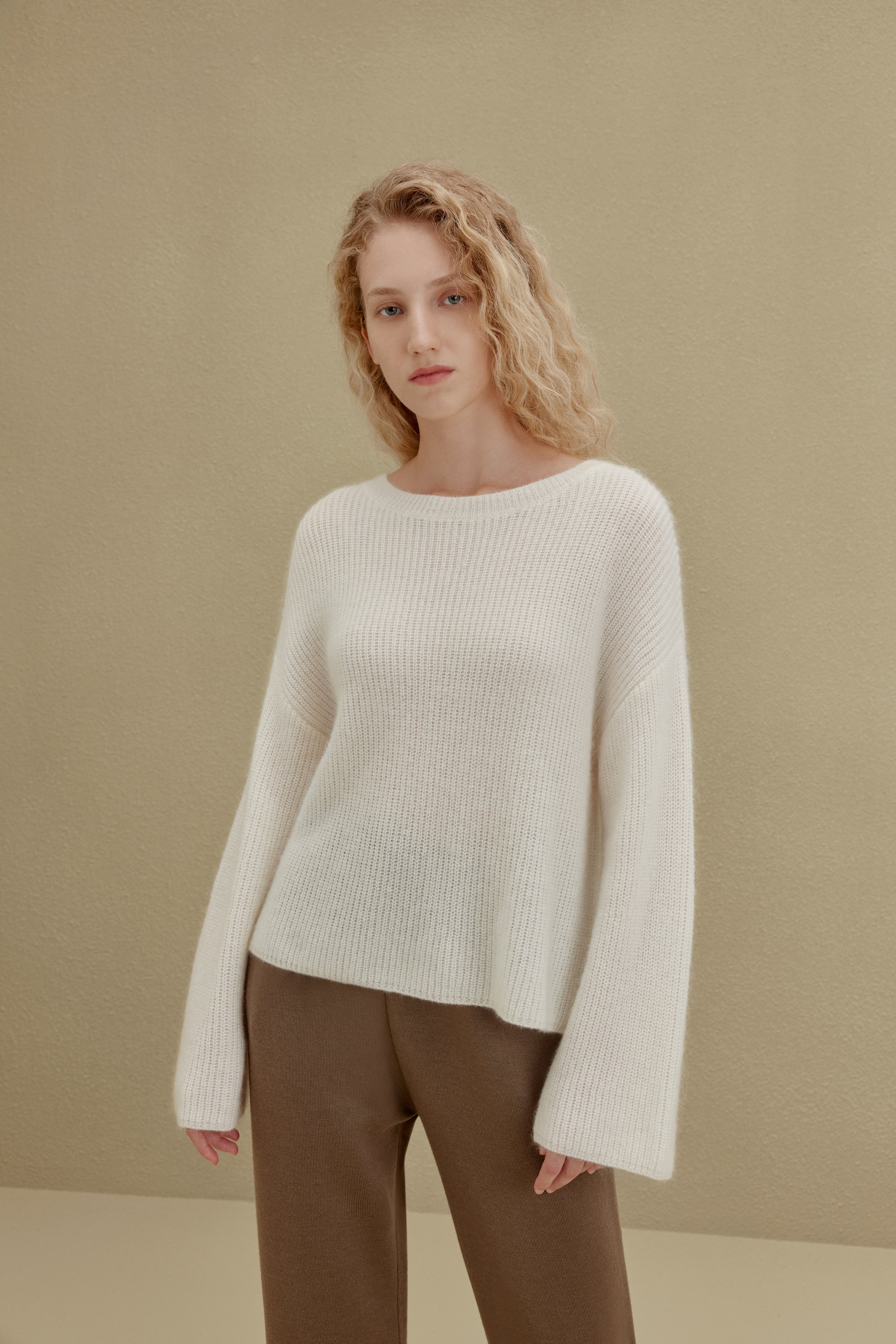 women in white sweater