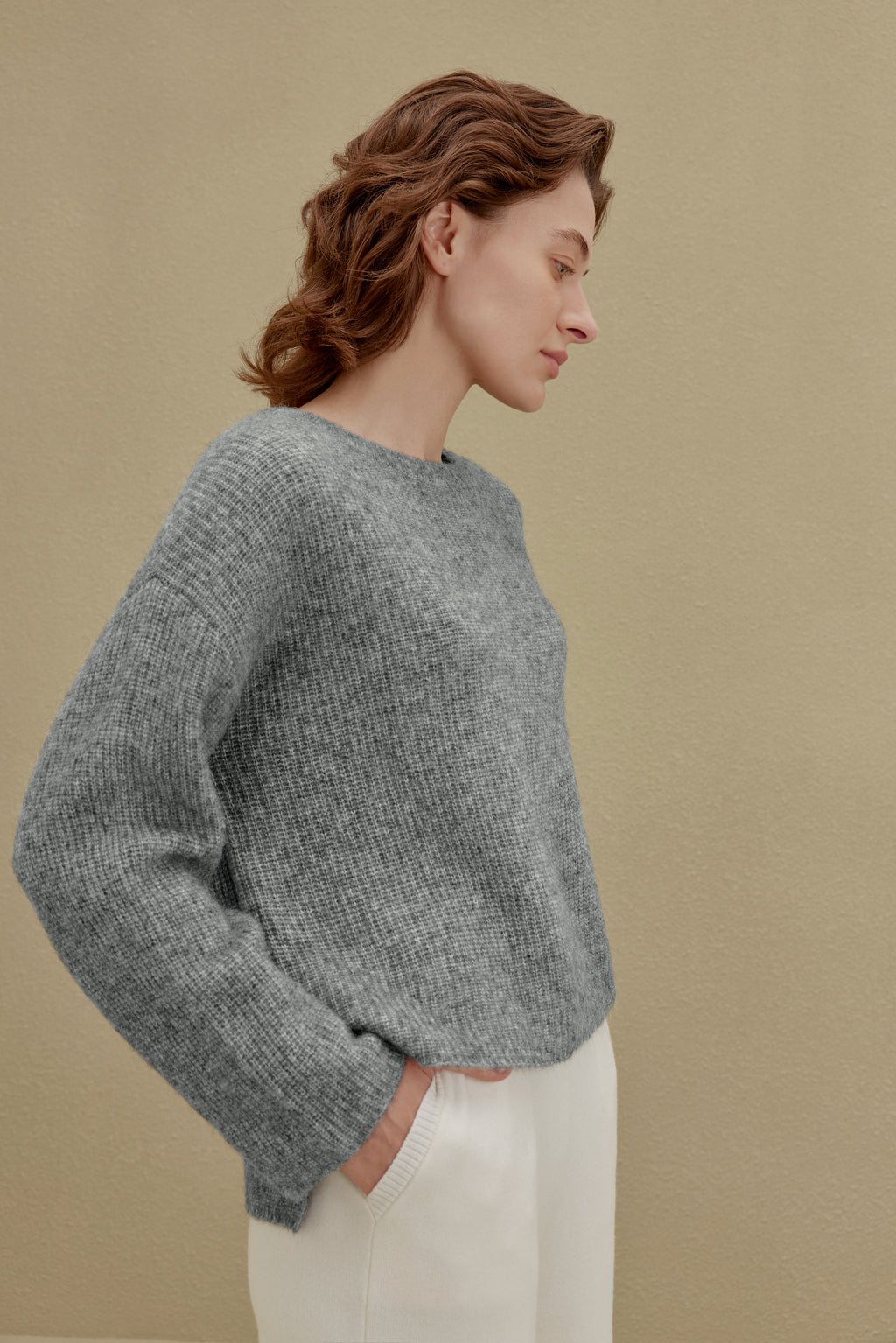 women in gray sweater