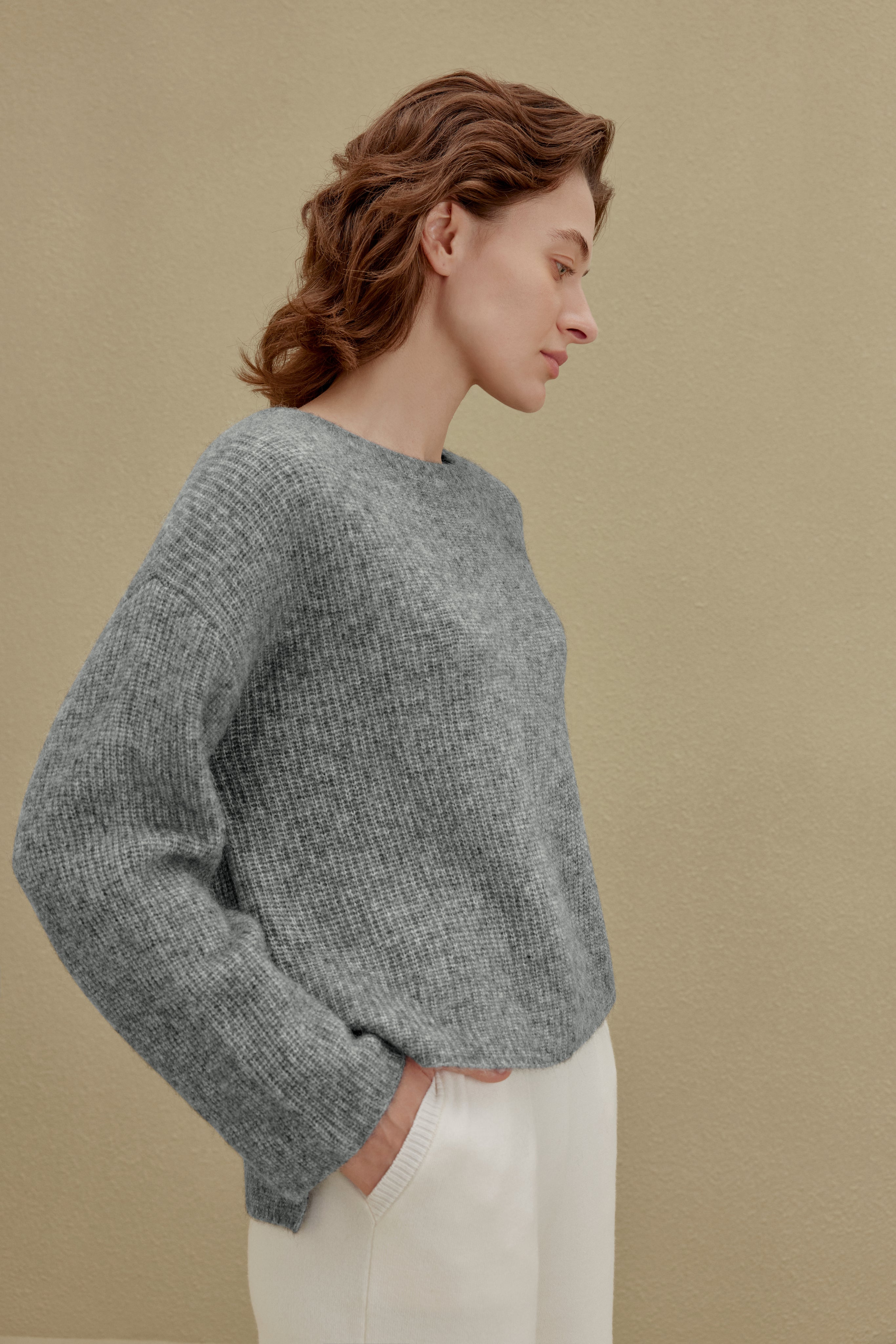 women in gray sweater