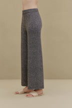 side view of black wide-leg pants