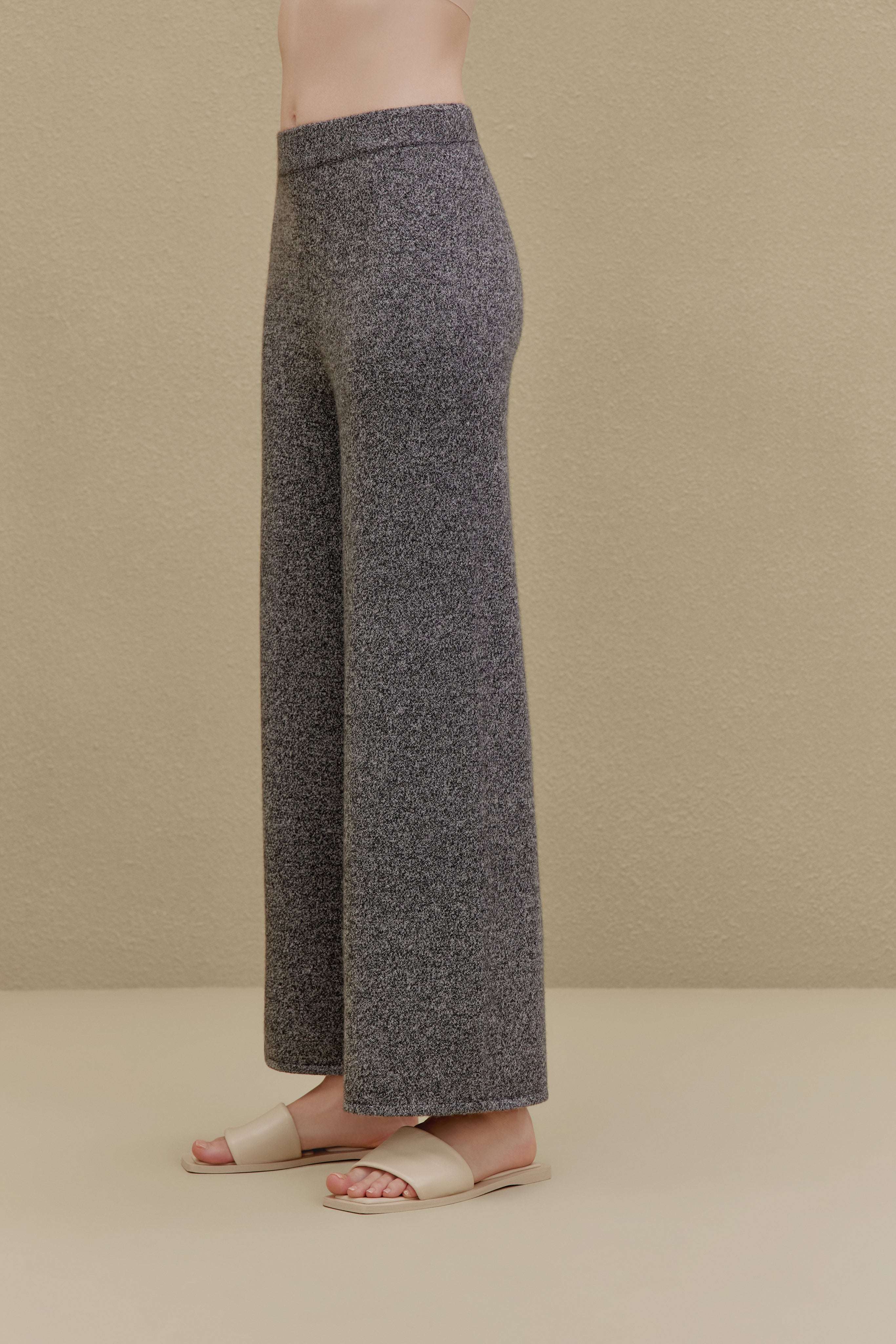 side view of black wide-leg pants