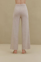 Close-up of off white wide-leg pants