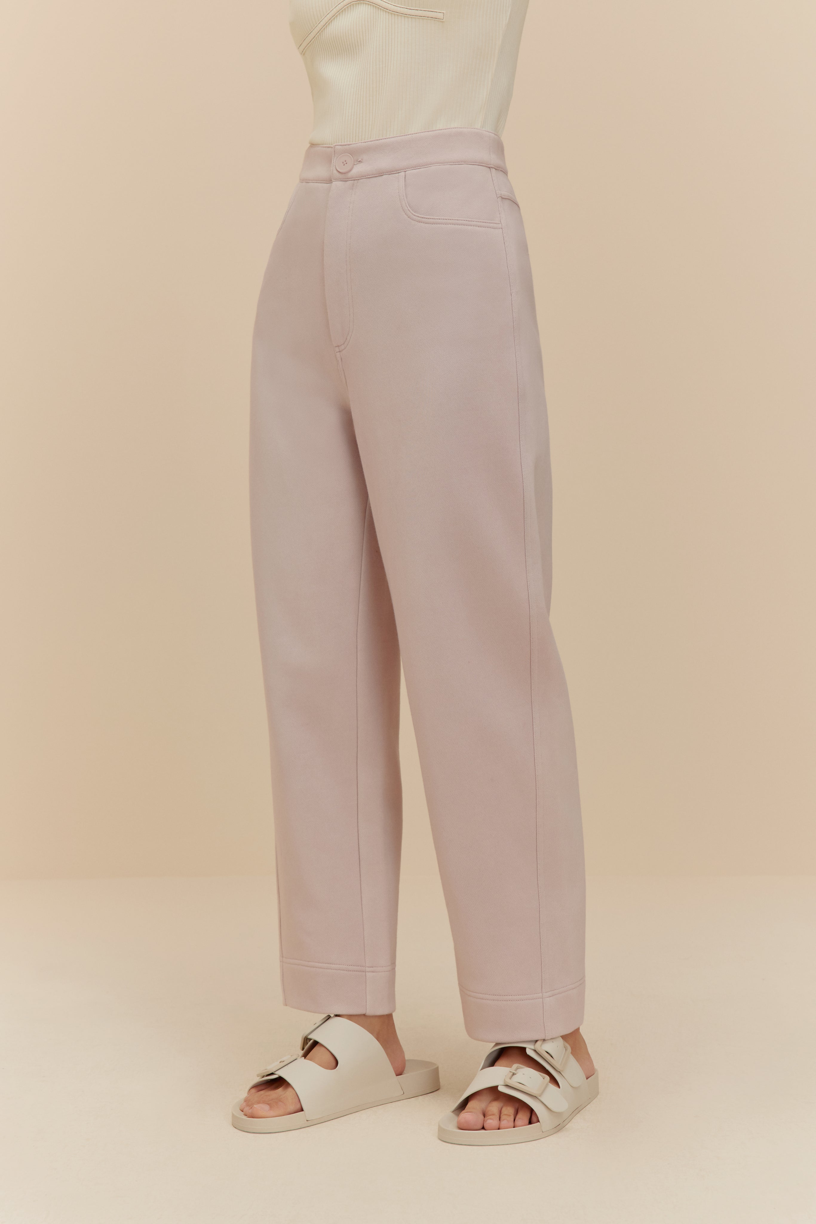 Woman in light purple pants