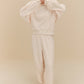 woman wearing white fleece pajama set