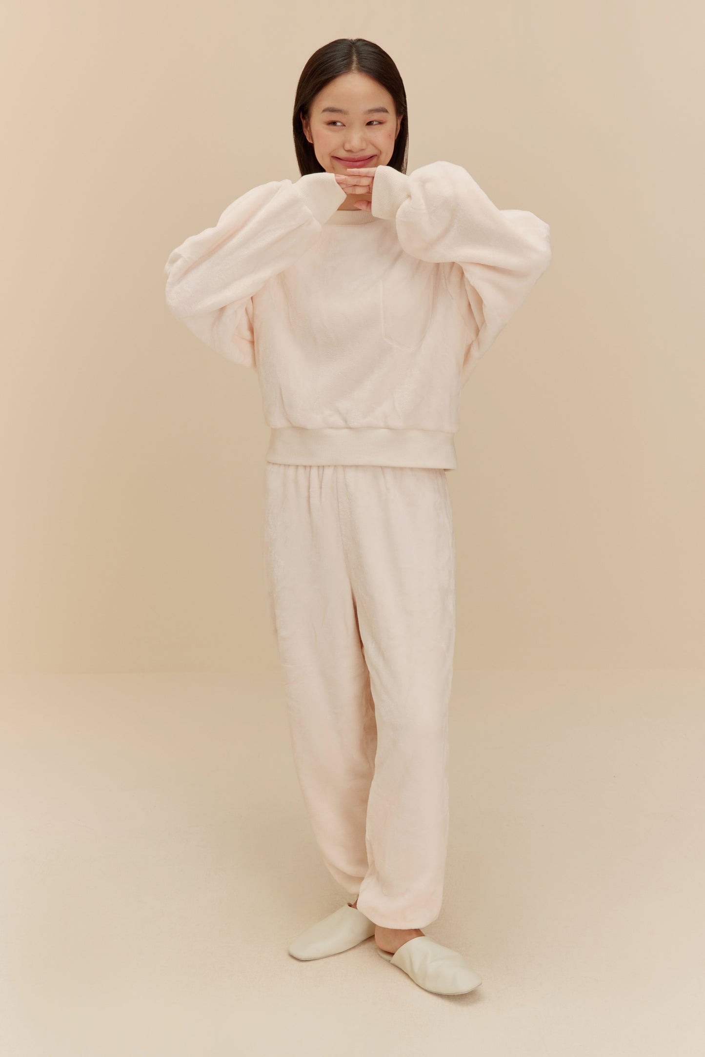woman wearing white fleece pajama set