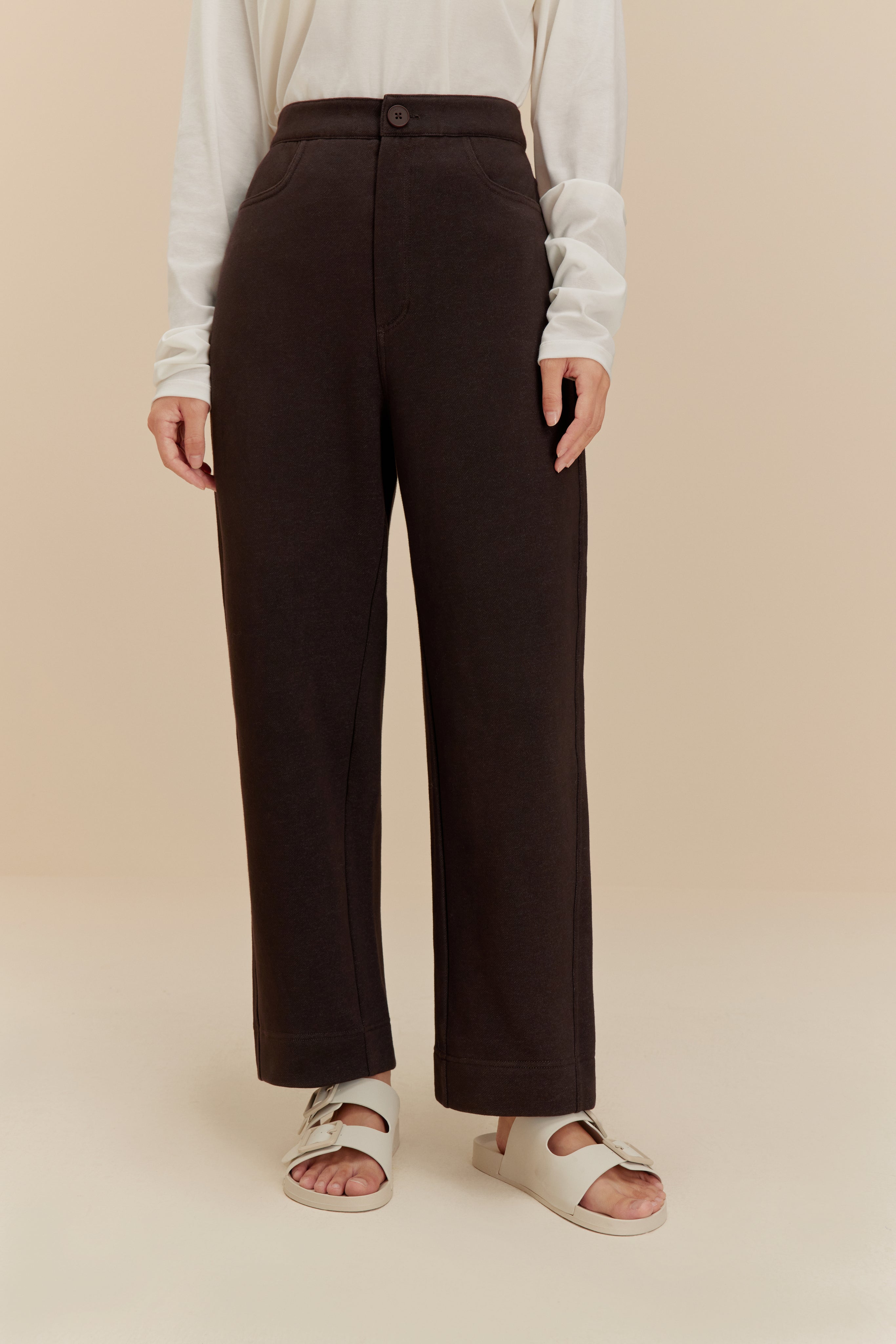 woman in brown pants
