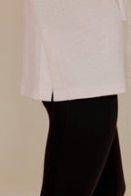 Close-up of white pullover