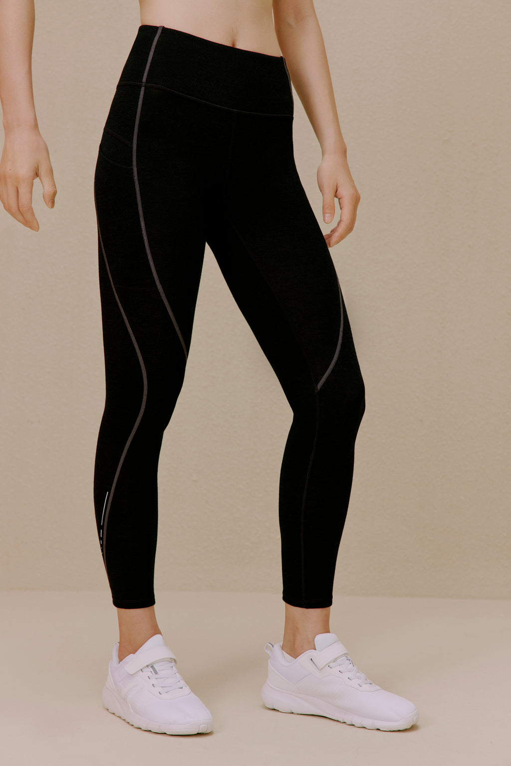 Woman wearing black leggings