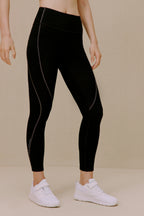 Woman wearing black leggings