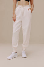 women in the white pants