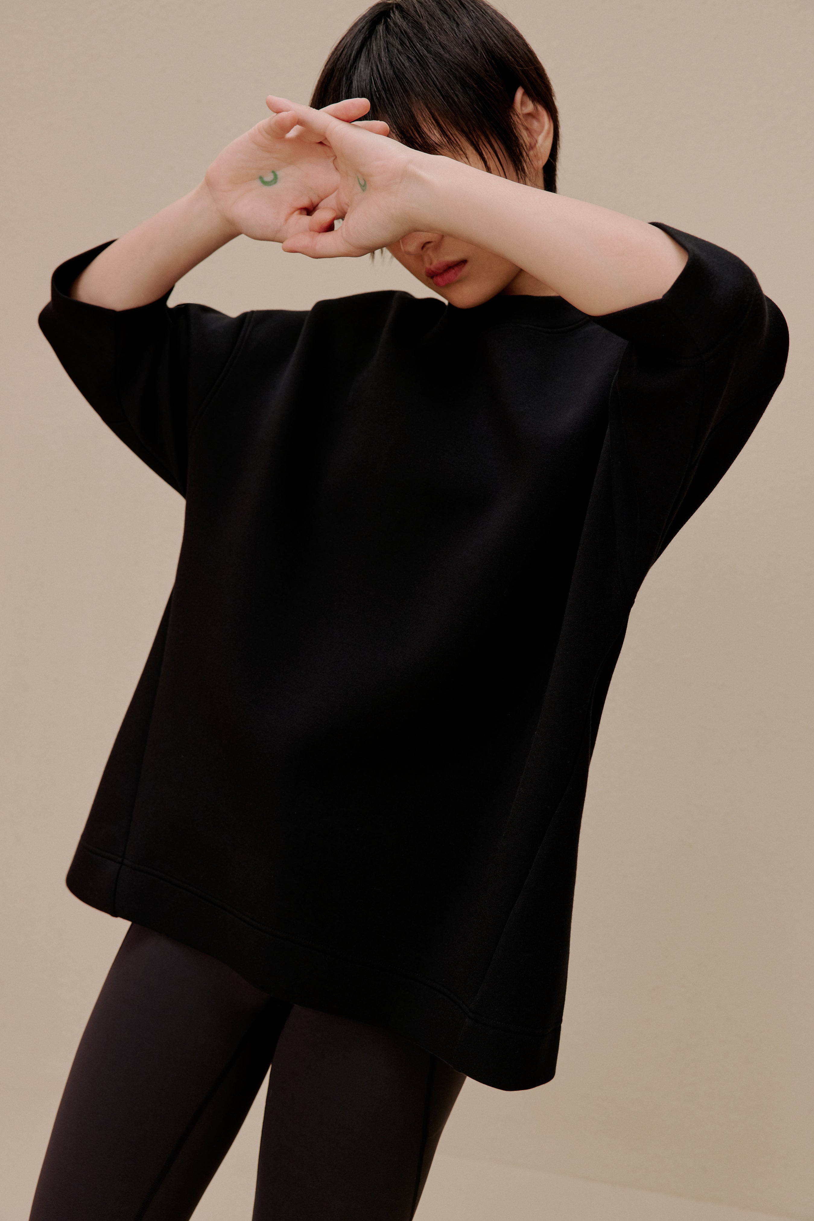 Woman in black top