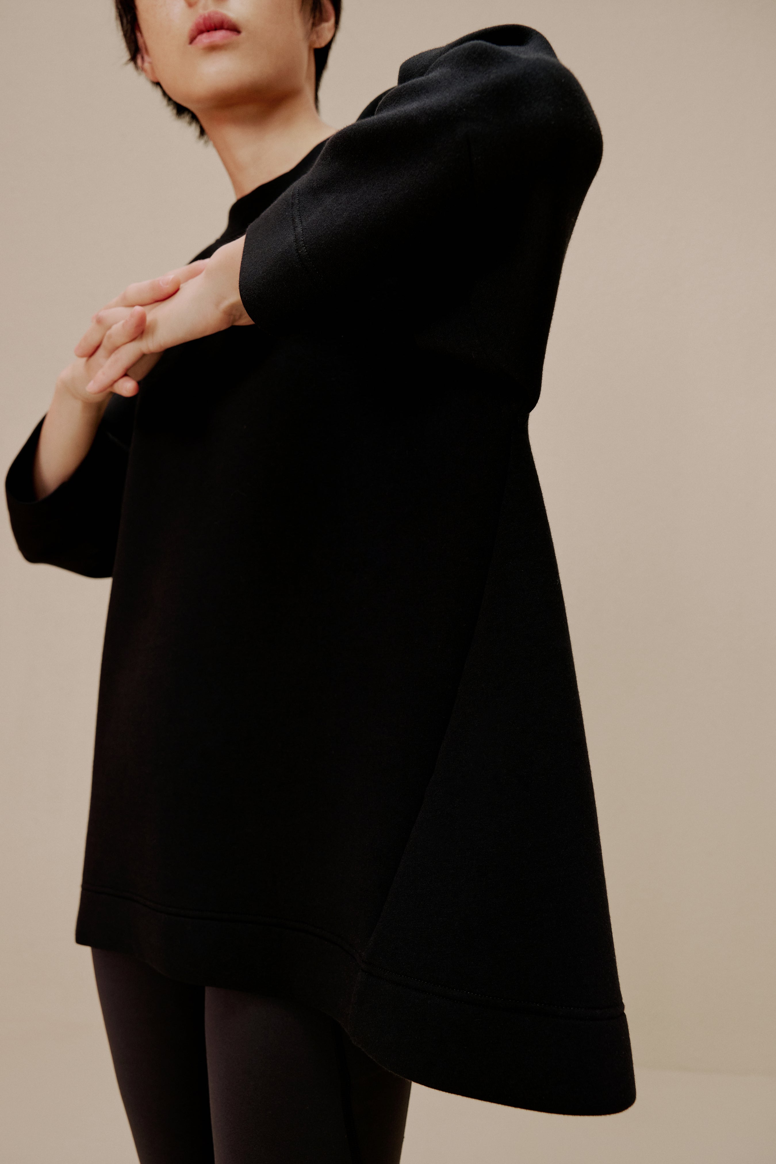 Woman in black top