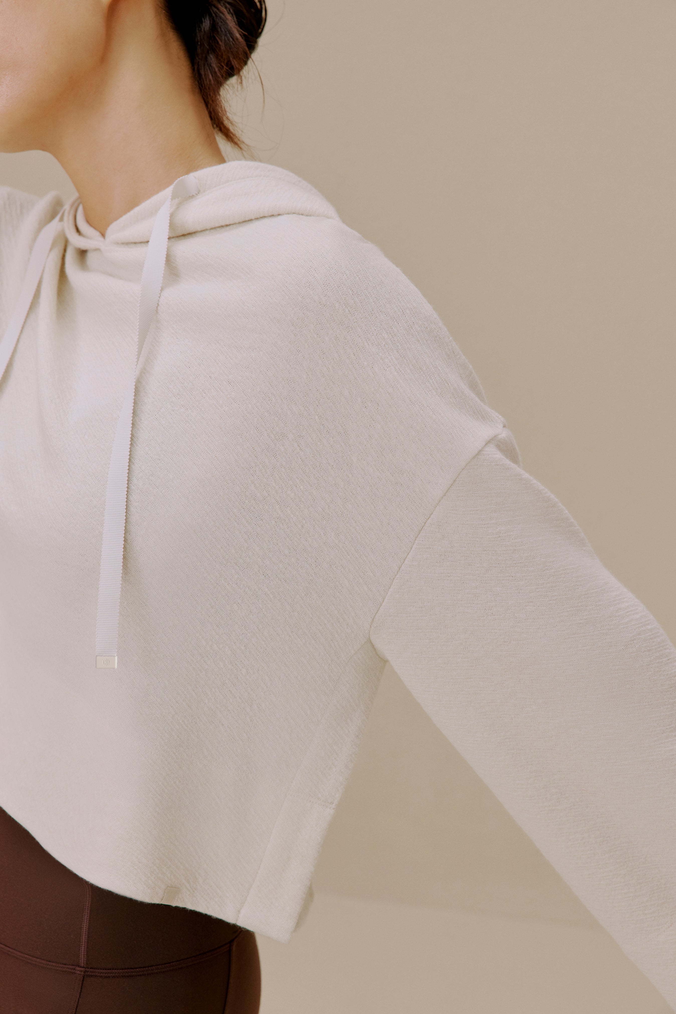 Close-up of white sweatshirt