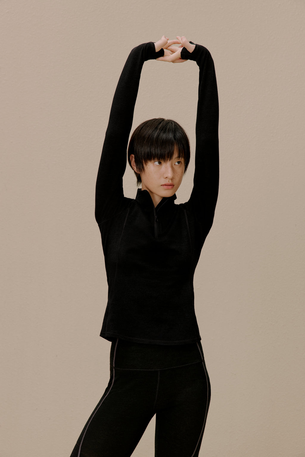 women in black active top
