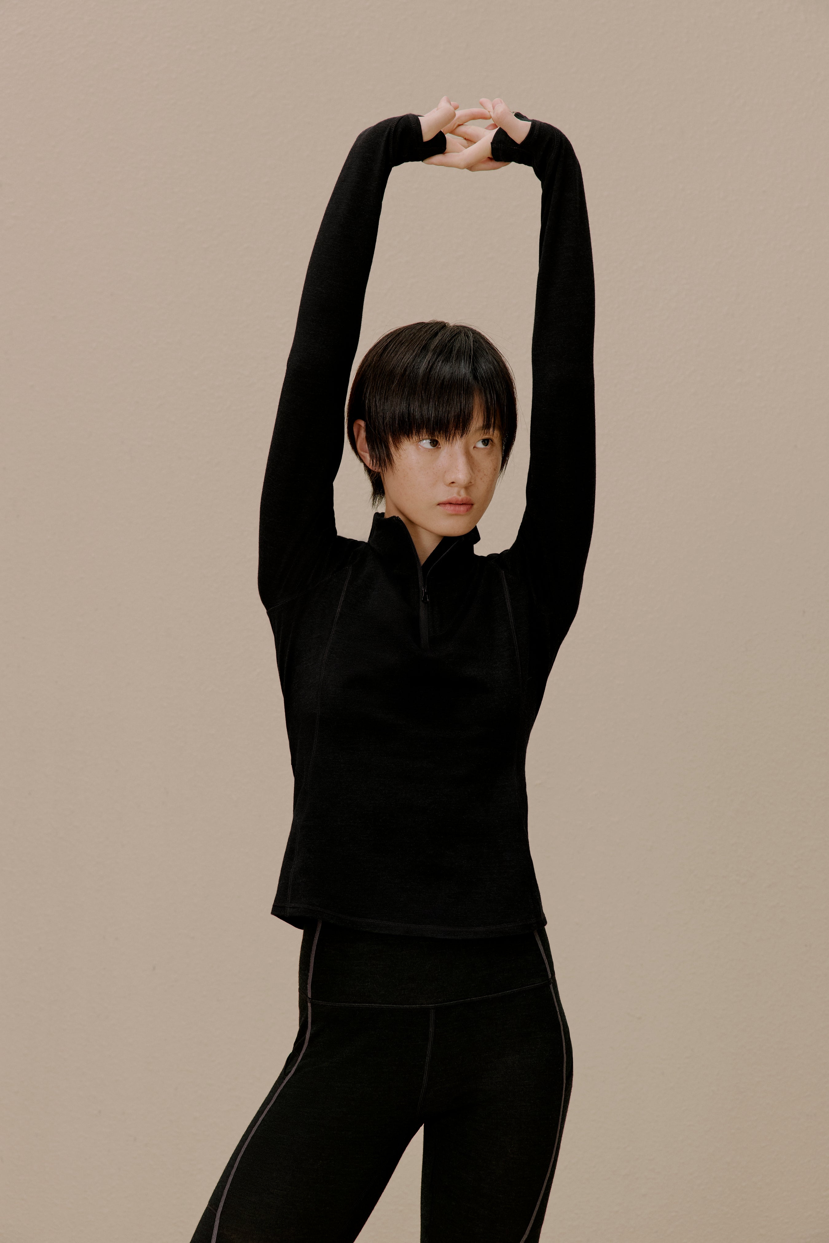 women in black active top