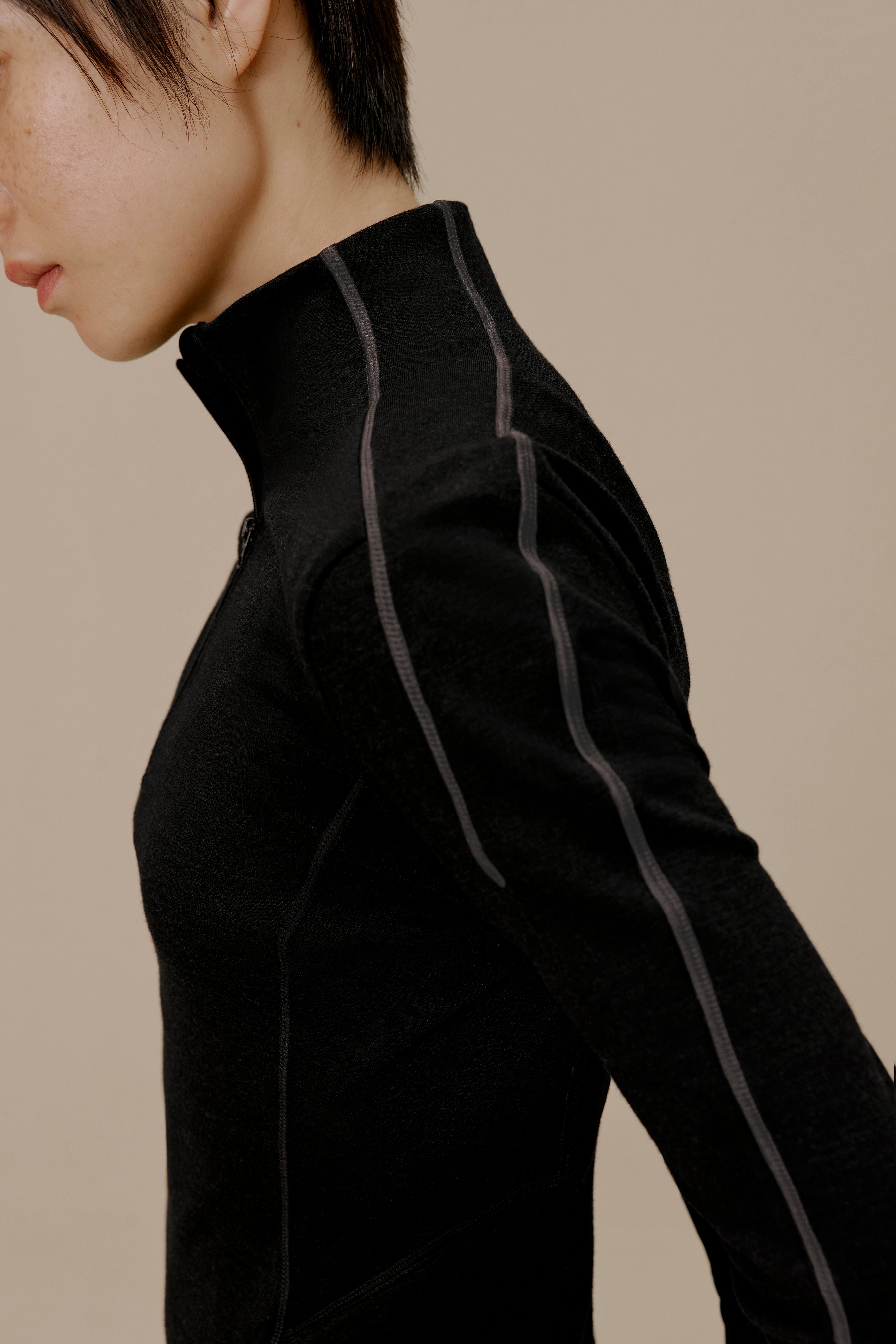 side of women in black active top