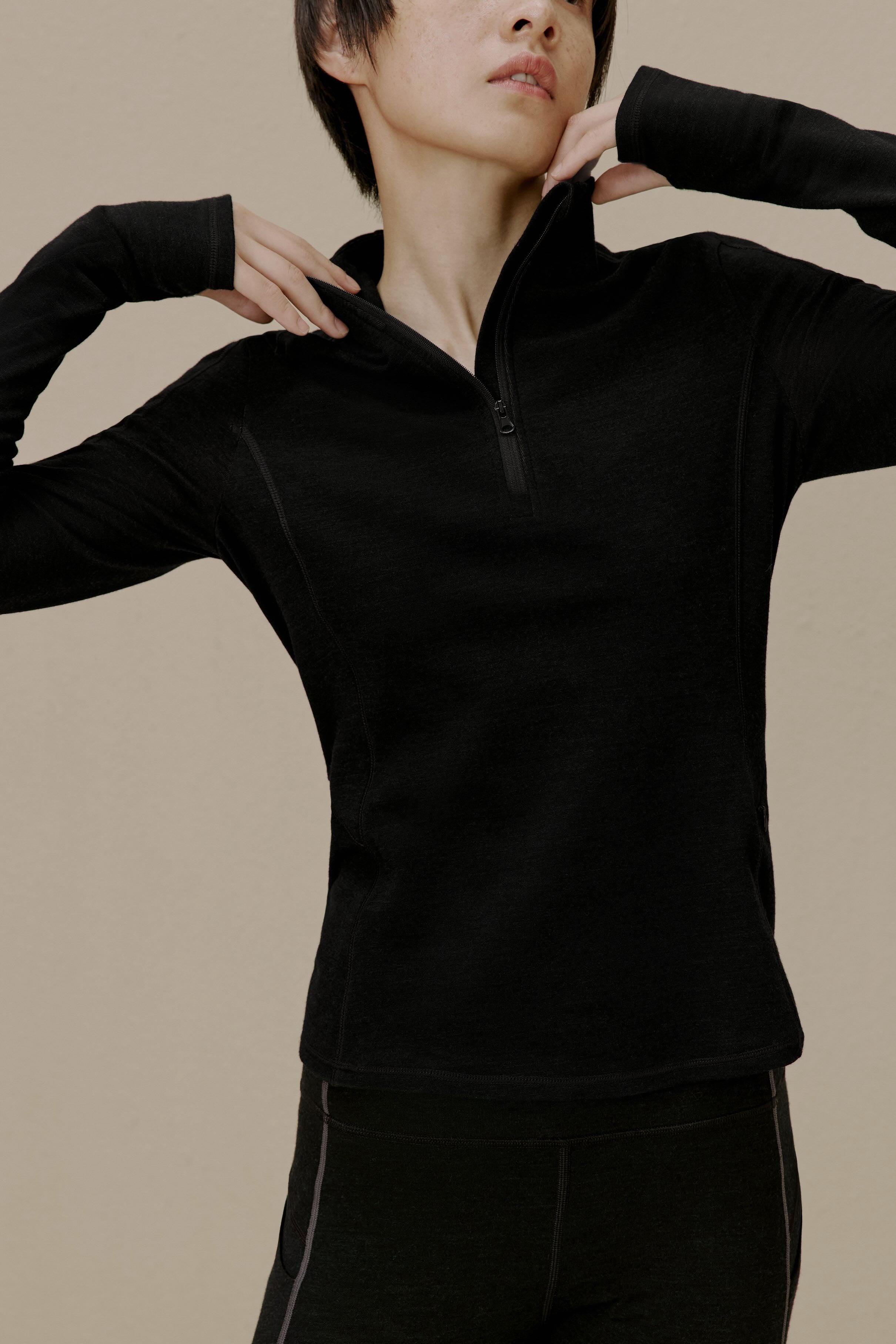 women in black active top
