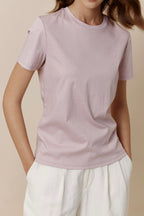 women in pink Tee