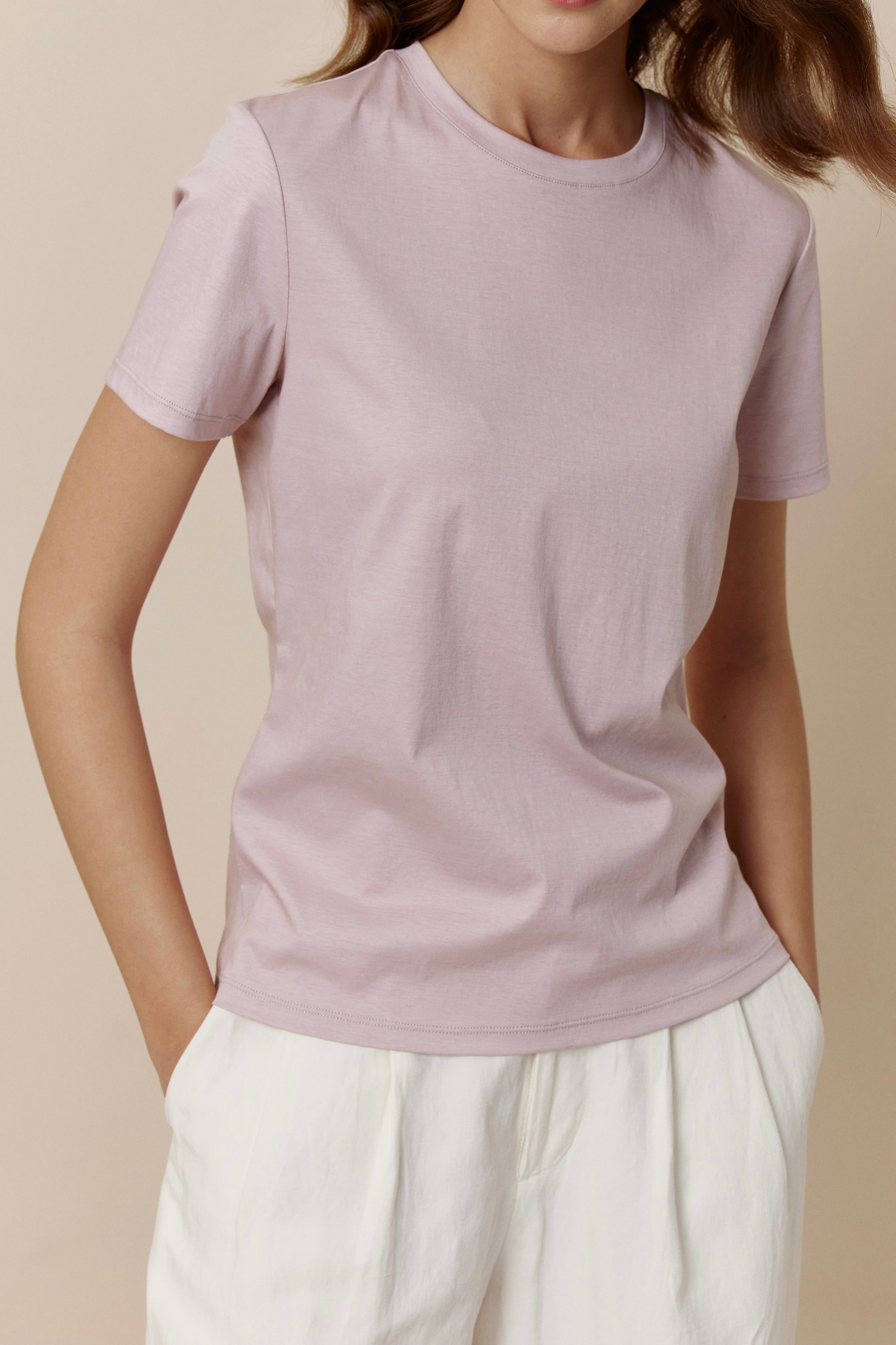 women in pink Tee