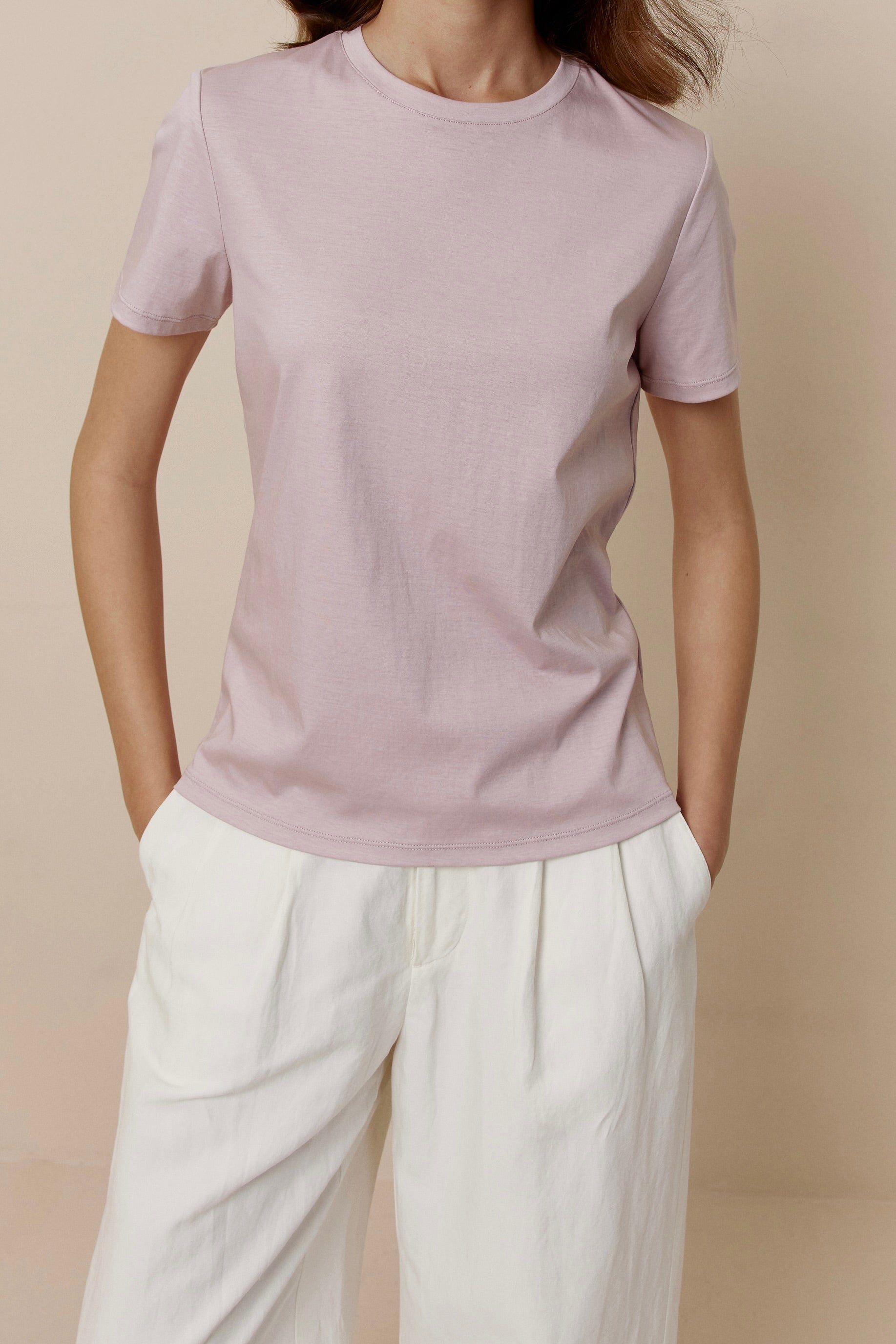women in pink Tee