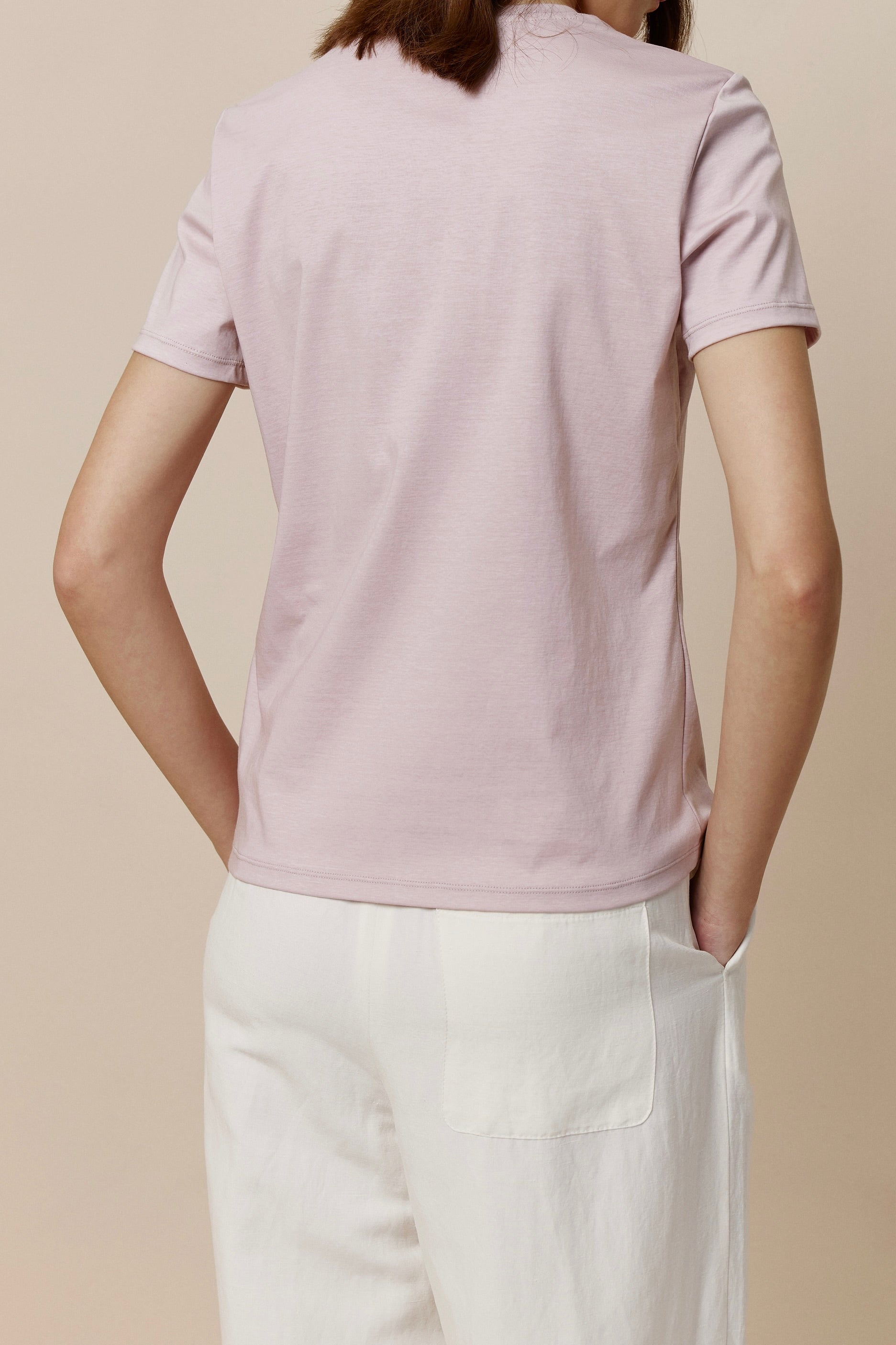 back of women in pink Tee