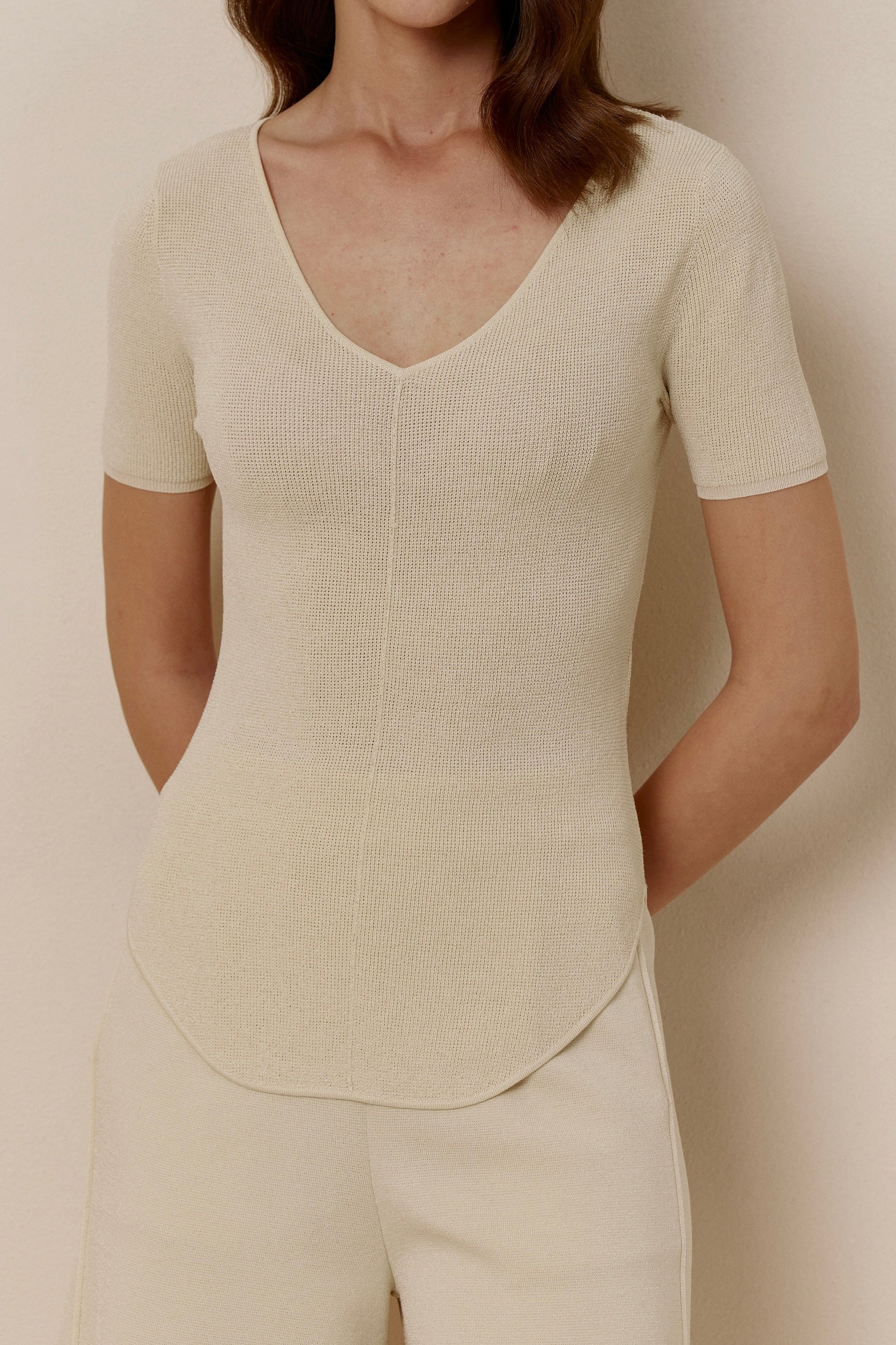 woman in off-white short-sleeved shirt