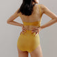 back of yellow bikini top and bottom