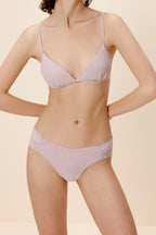 women in light purple bra and bief