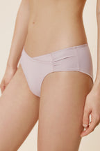 side of women in light purple brief