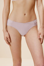 women in light purple brief