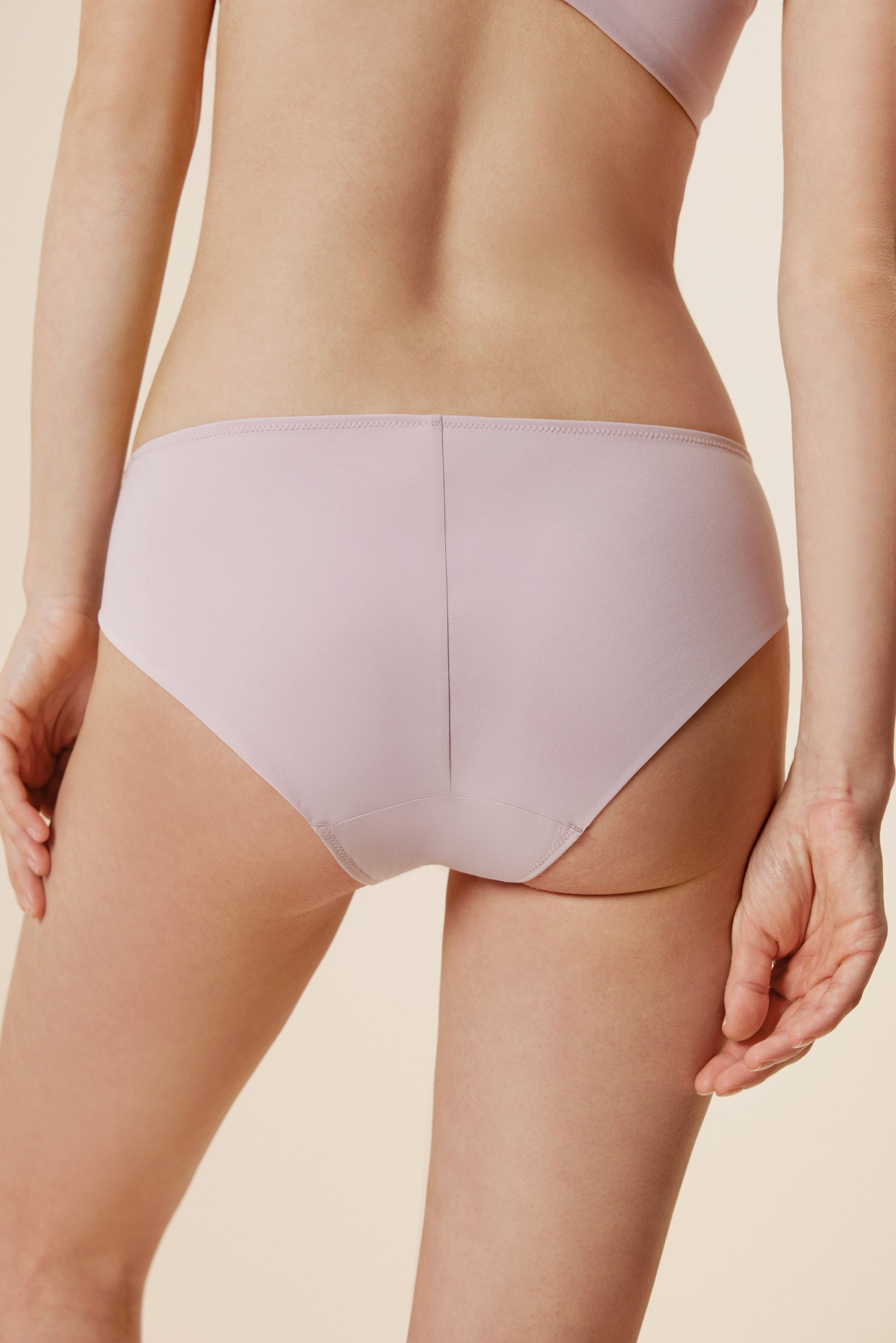 back of women in light purple brief