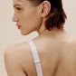 back of woman in off white bra
