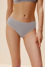 woman in lavender brief