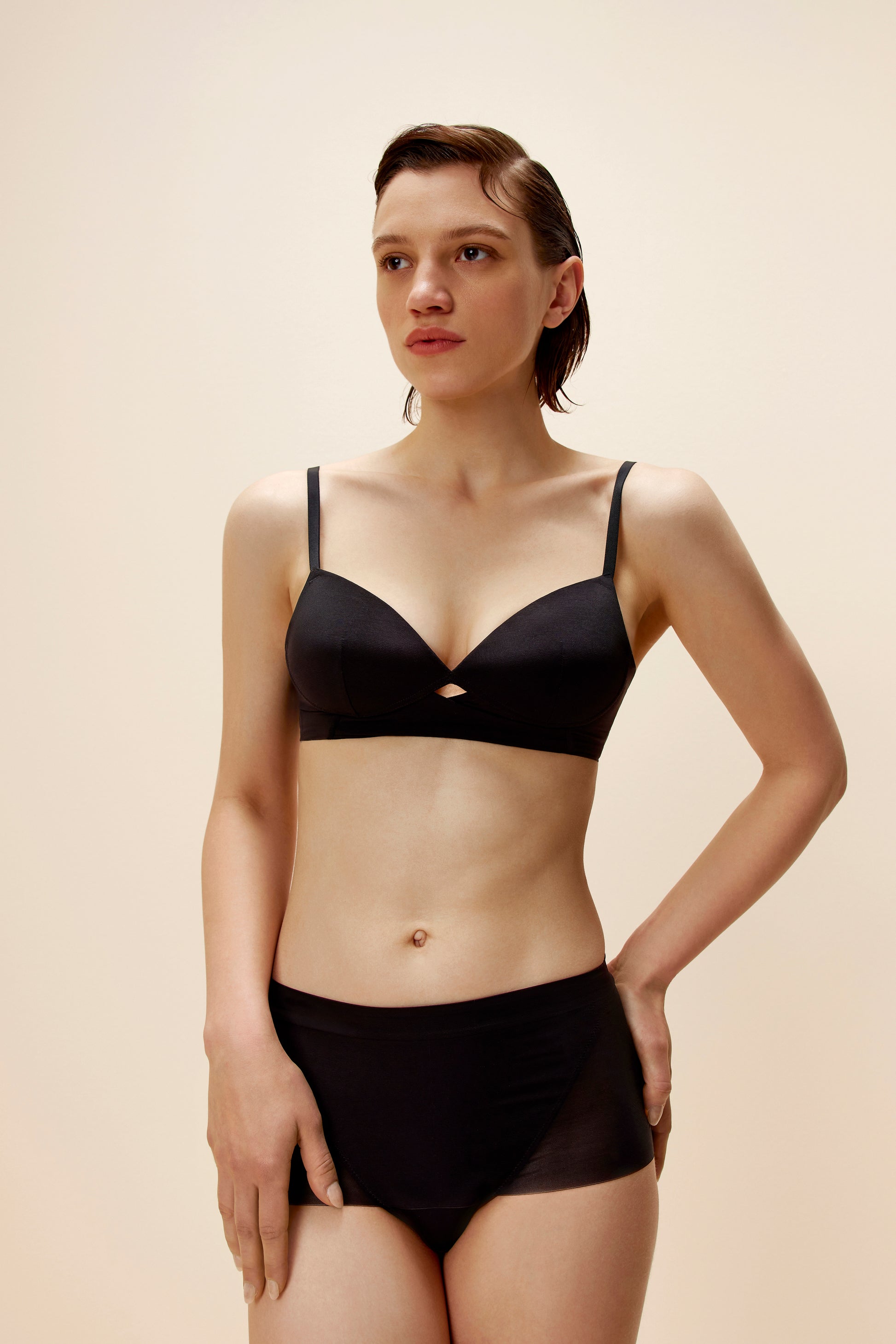woman wearing black bra and brief