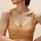 woman in caramel color bra with wavy rim details