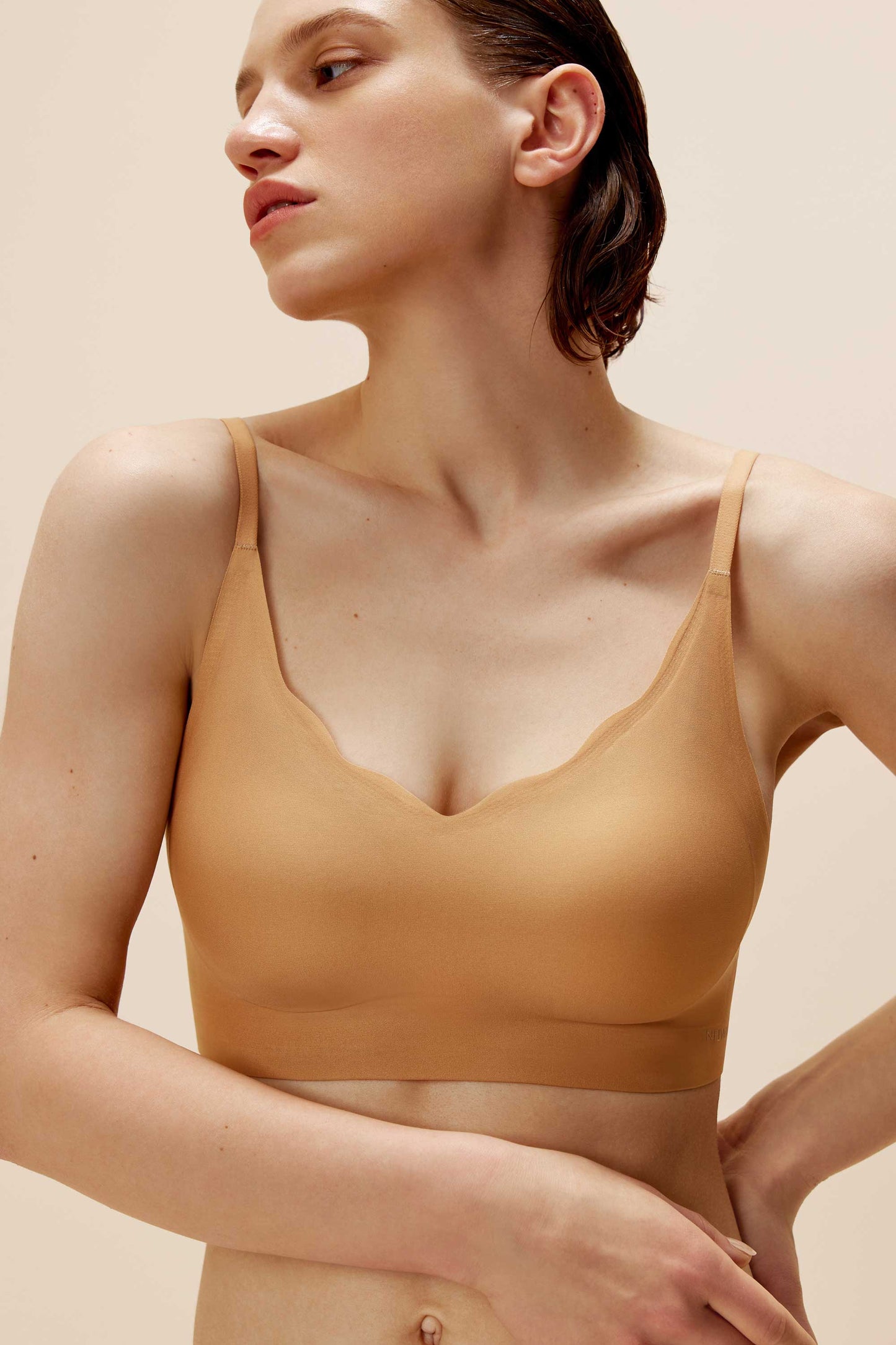 woman in caramel color bra with wavy rim details
