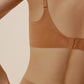 back of woman in tan bra 