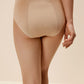 back of woman in tan underwear