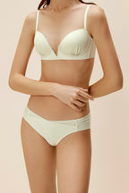 women in white bra and brief