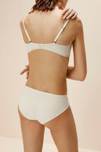 back of women in white bra and brief