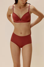 woman in maroon bra and brief
