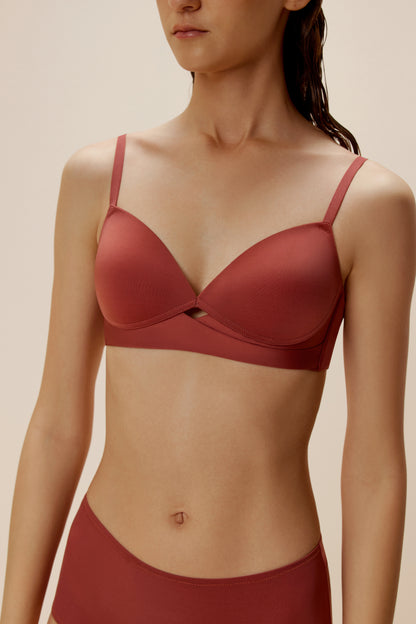 woman in maroon bra and brief