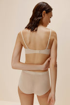 woman wearing beige bra and brief back