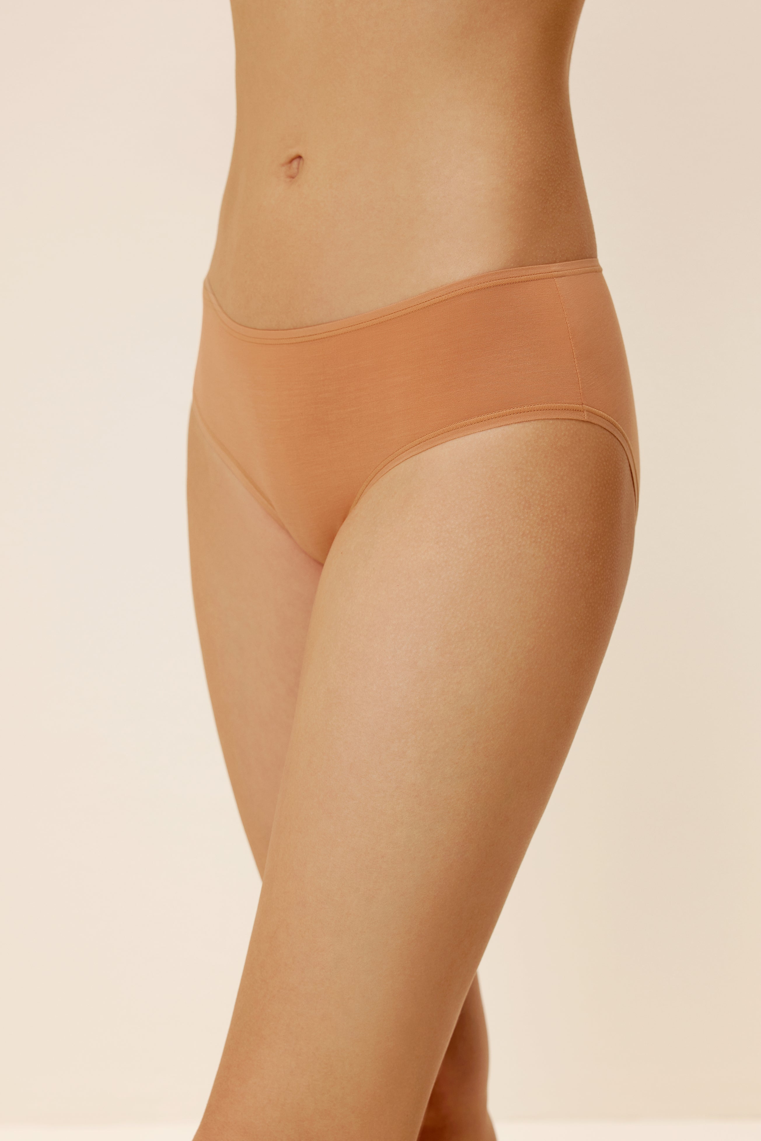 woman in brick color brief