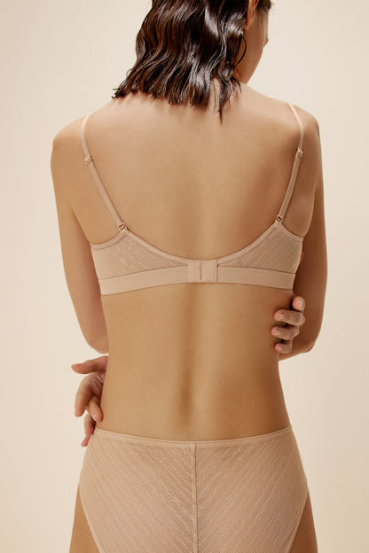 back pf women in nude bra and brief