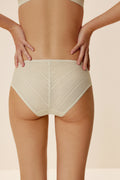 back of women in white brief 