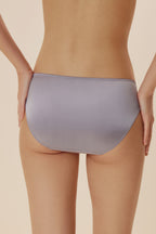 back of women in purple brief
