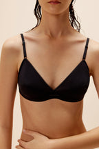 woman wearing black bra