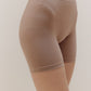 woman in tan shorts